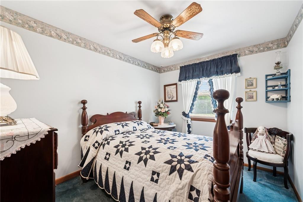207 State Park Road New Alexandria, PA 15670 - Photo 20 of 38 a bedroom with a bed and wooden floor