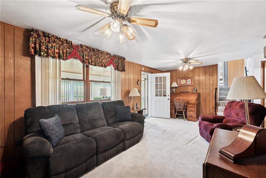 207 State Park Road New Alexandria, PA 15670 - Photo 24 of 38 a living room with furniture ceiling fan and a rug