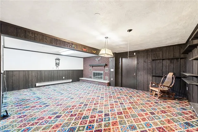 a bathroom with a sink a mirror and a shower