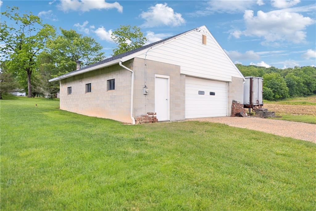 207 State Park Road New Alexandria, PA 15670 - Photo 34 of 38 a backyard of a house with lots of green space