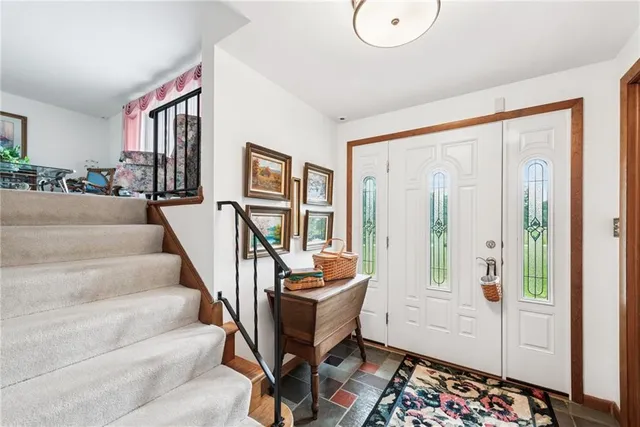 a living room with furniture and a table