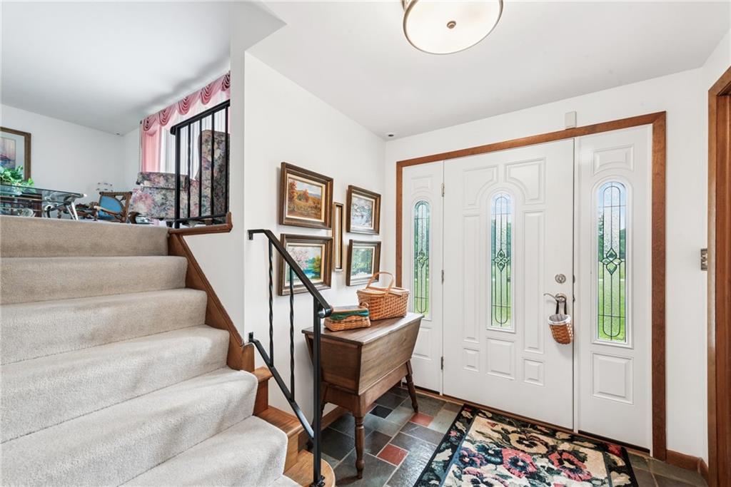207 State Park Road New Alexandria, PA 15670 - Photo 5 of 38 a living room with furniture and a table