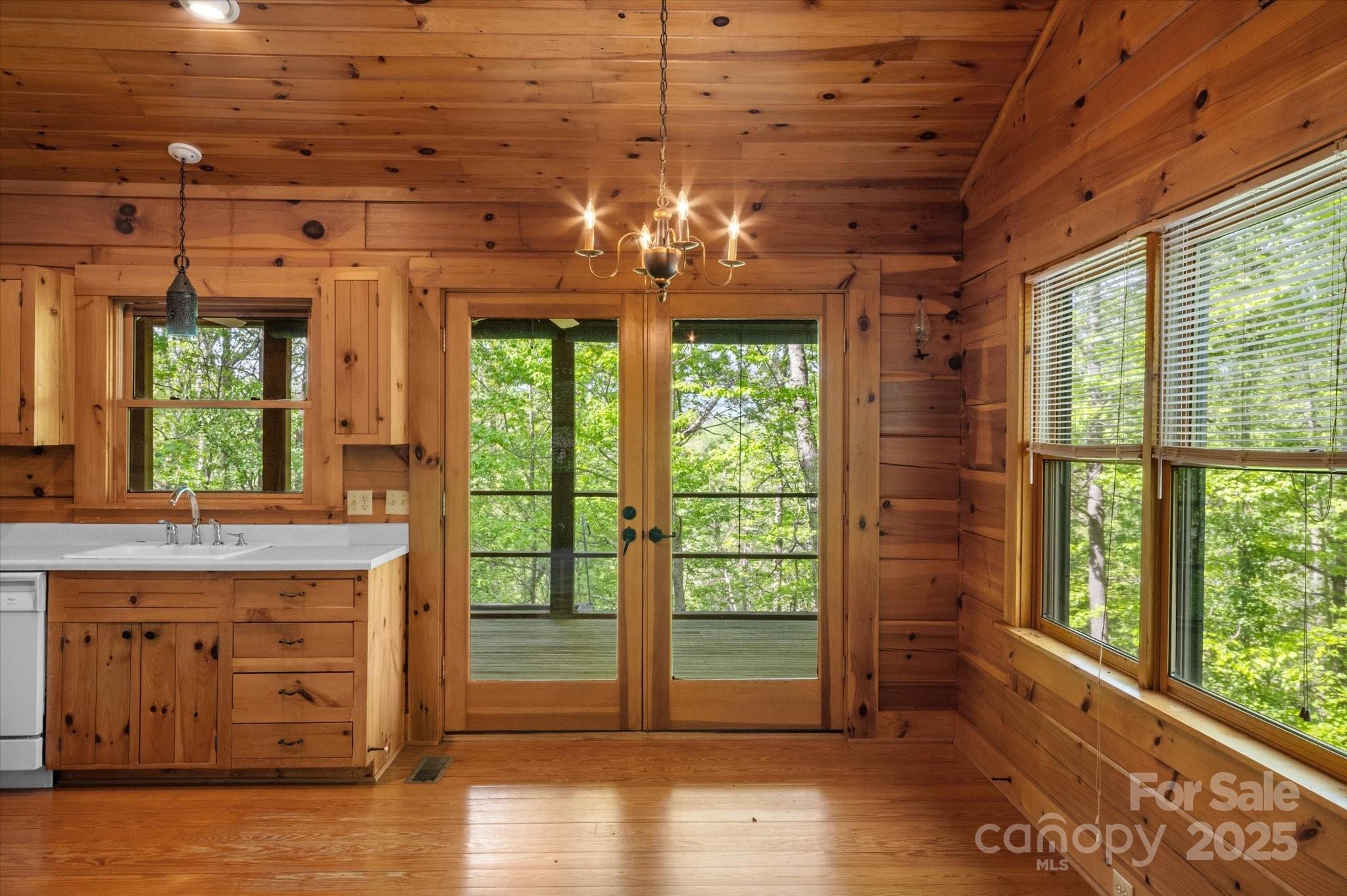 447 Cherokee Circle Tryon, NC 28782 - Photo 15 of 36 a view of a room with wooden floor and windows