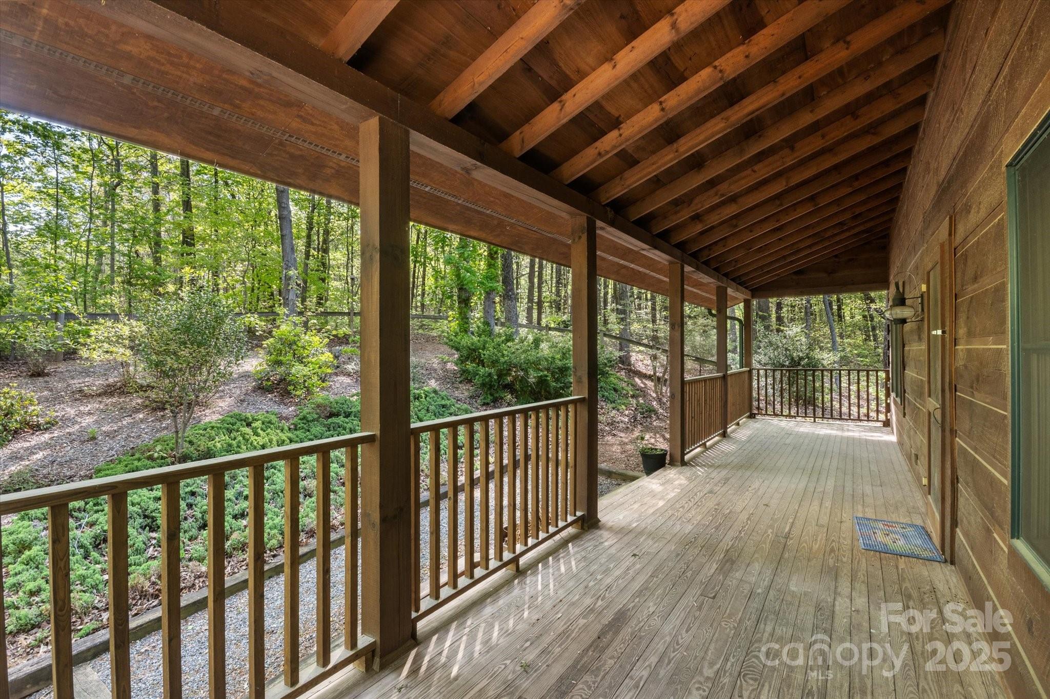 447 Cherokee Circle Tryon, NC 28782 - Photo 9 of 36 a view of a balcony with wooden floor