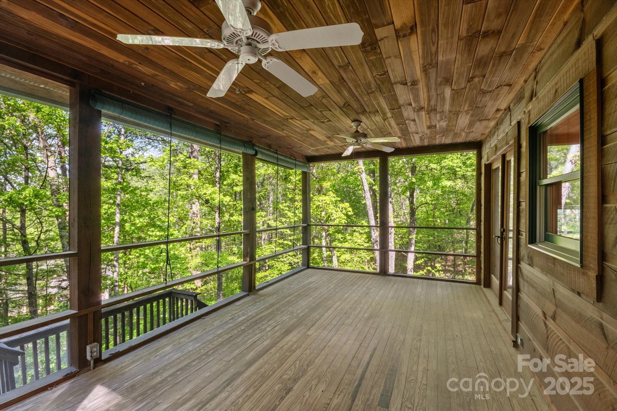 447 Cherokee Circle Tryon, NC 28782 - Photo 10 of 36 a view of porch with wooden floor