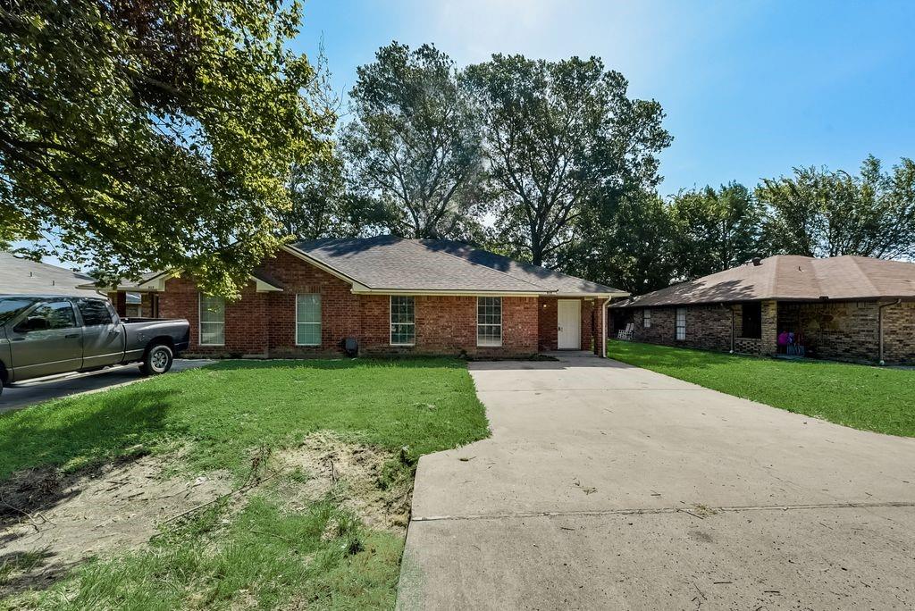 919 Farmington Road, Unit 919 Howe, TX 75459 - Photo 1 of 14 a front view of a house with garden