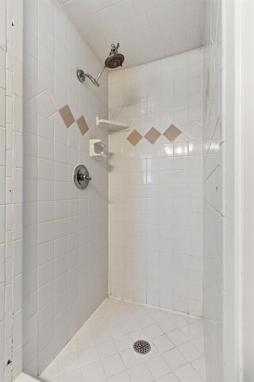 1760 Acorn Lane Hurst, TX 76054 - Photo 30 of 36 a bathroom with a shower