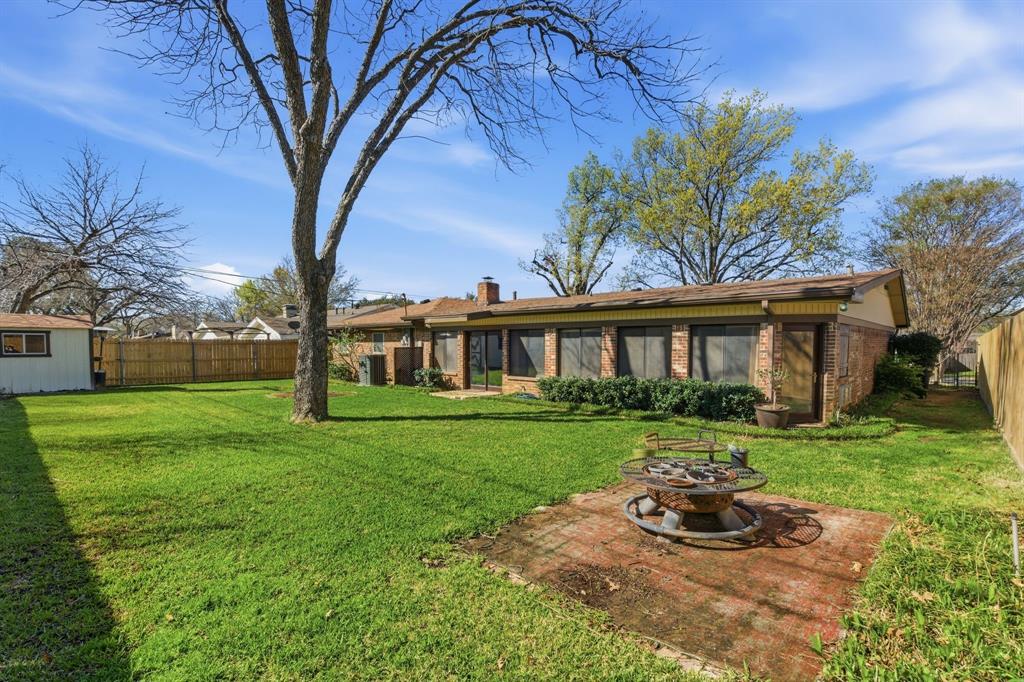 1760 Acorn Lane Hurst, TX 76054 - Photo 32 of 36 a view of a house with a yard