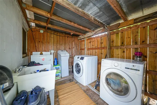 a utility room with dryer and washer