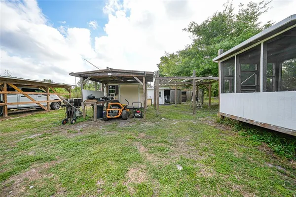 a view of a house with a back yard
