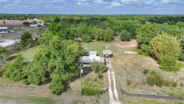 a view of a garden with a lake view