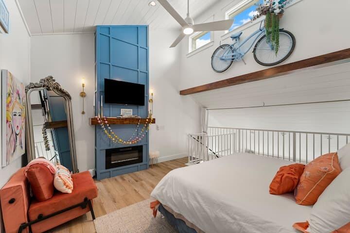 32461 East County Highway 30A, Unit 17 Inlet Beach, FL 32461 - Photo 17 of 53 a bedroom with furniture and a fireplace
