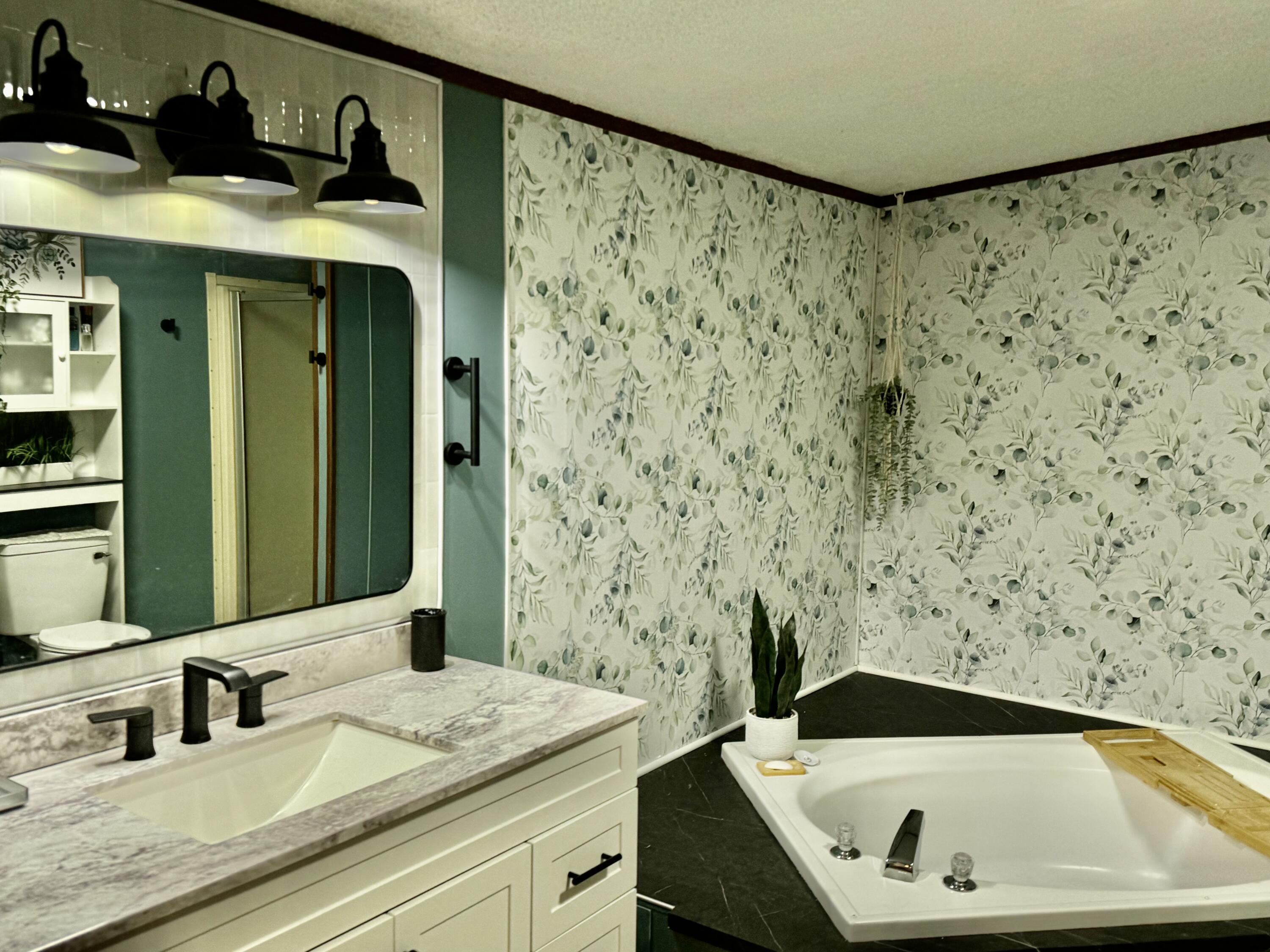 6249 Joppa Mill Road Moneta, VA 24121 - Photo 13 of 55 a bathroom with a sink and a mirror