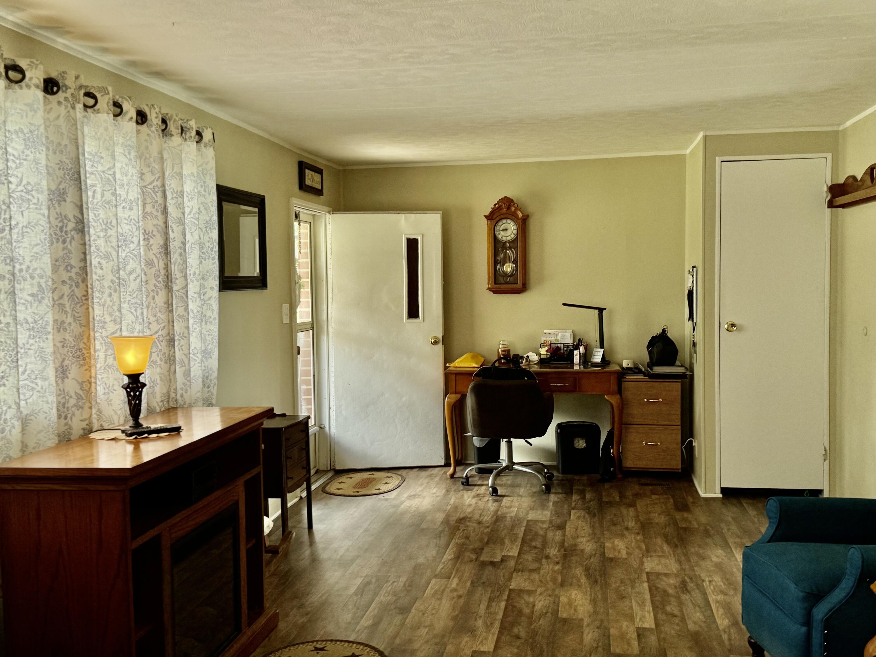 6249 Joppa Mill Road Moneta, VA 24121 - Photo 27 of 55 a view of a workspace with furniture and a bathroom