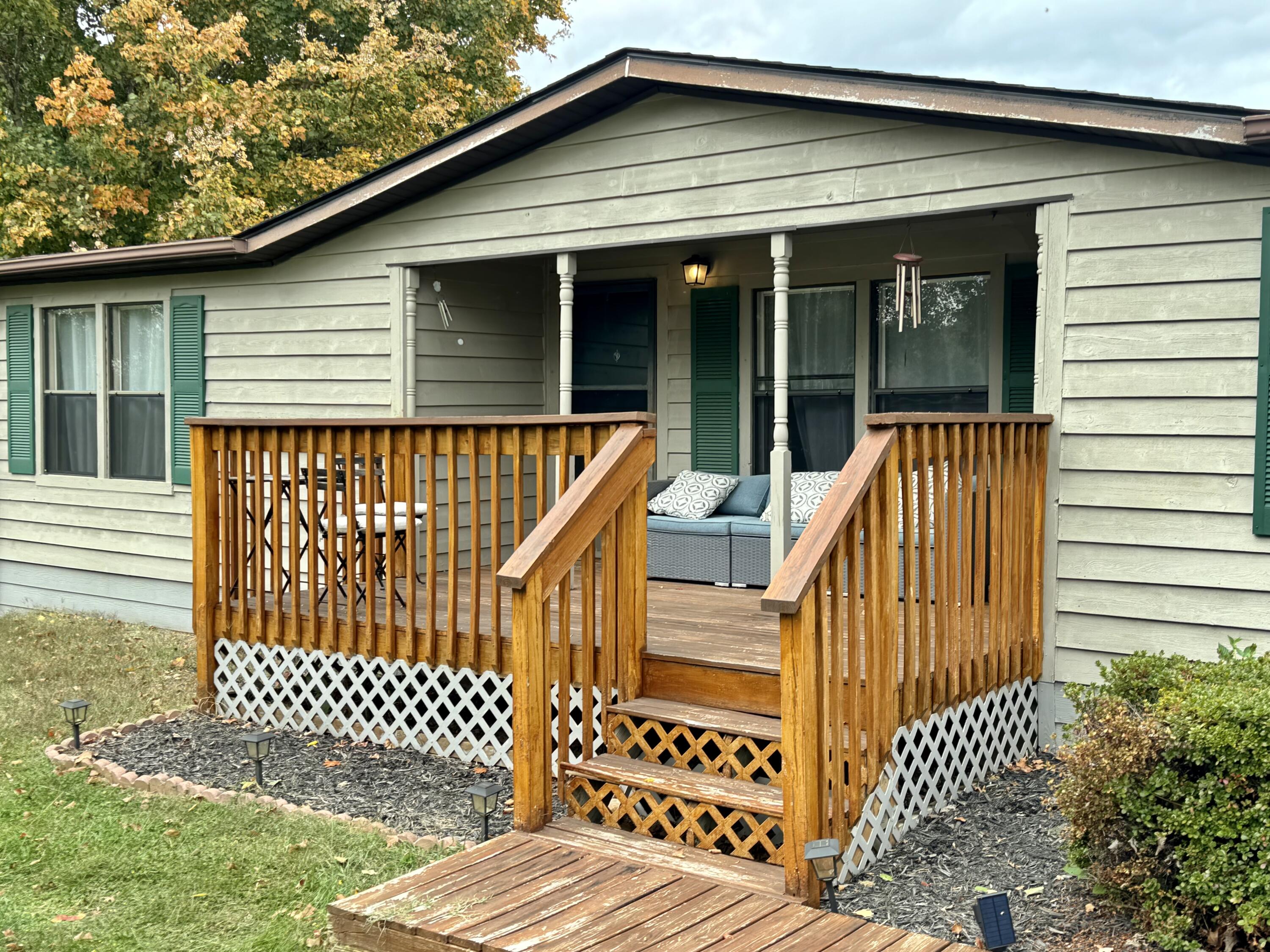 6249 Joppa Mill Road Moneta, VA 24121 - Photo 3 of 55 a view of outdoor space with deck and furniture