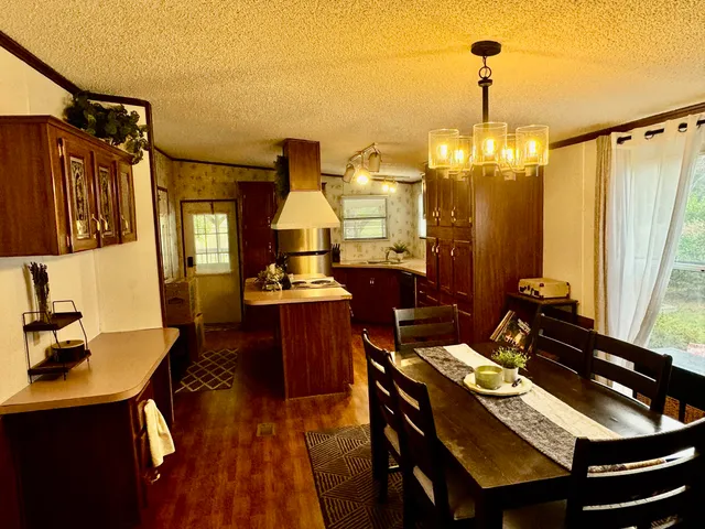 a view of a workspace with furniture