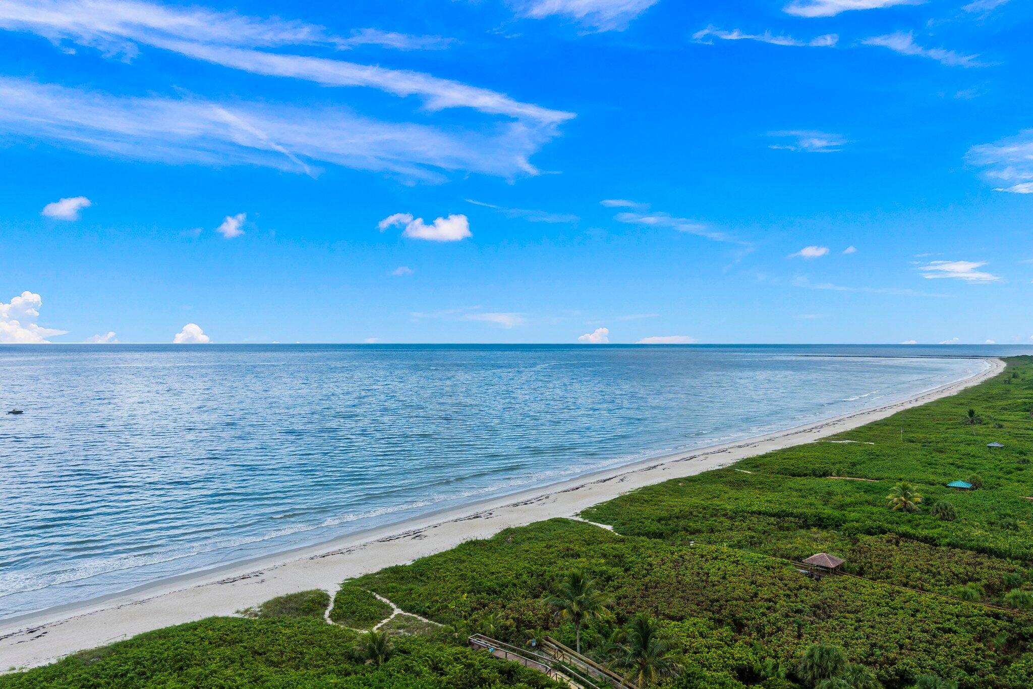 3100 North Hwy A1A, Unit PHA4 Fort Pierce, FL 34949 - Photo 23 of 54 a view of an ocean beach and an outdoor space