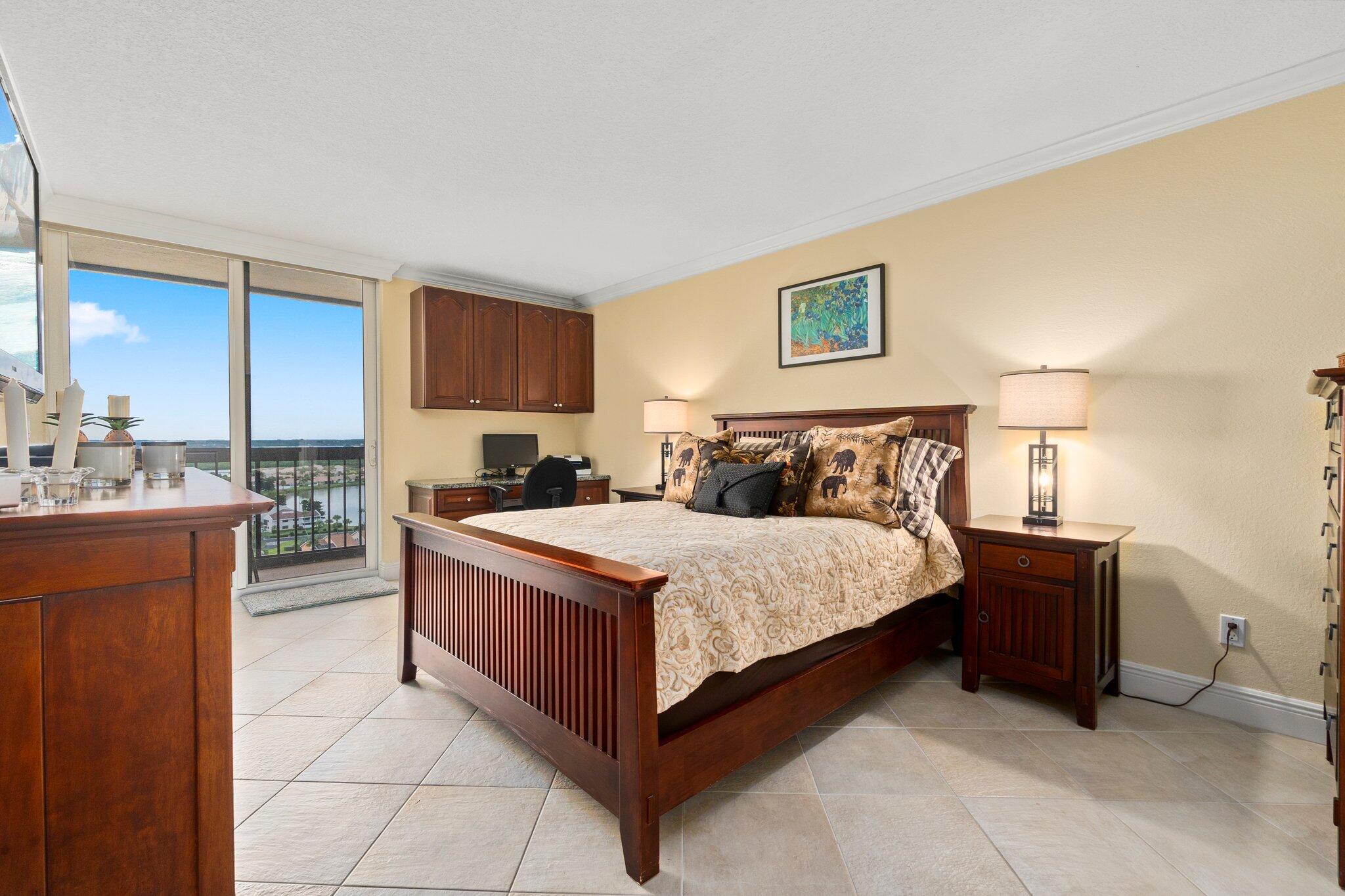 3100 North Hwy A1A, Unit PHA4 Fort Pierce, FL 34949 - Photo 24 of 54 a bedroom with a bed and a couch