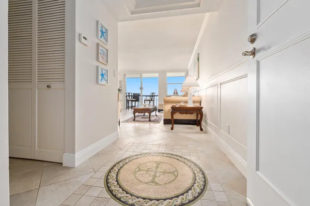 a view of a tall building next to a road