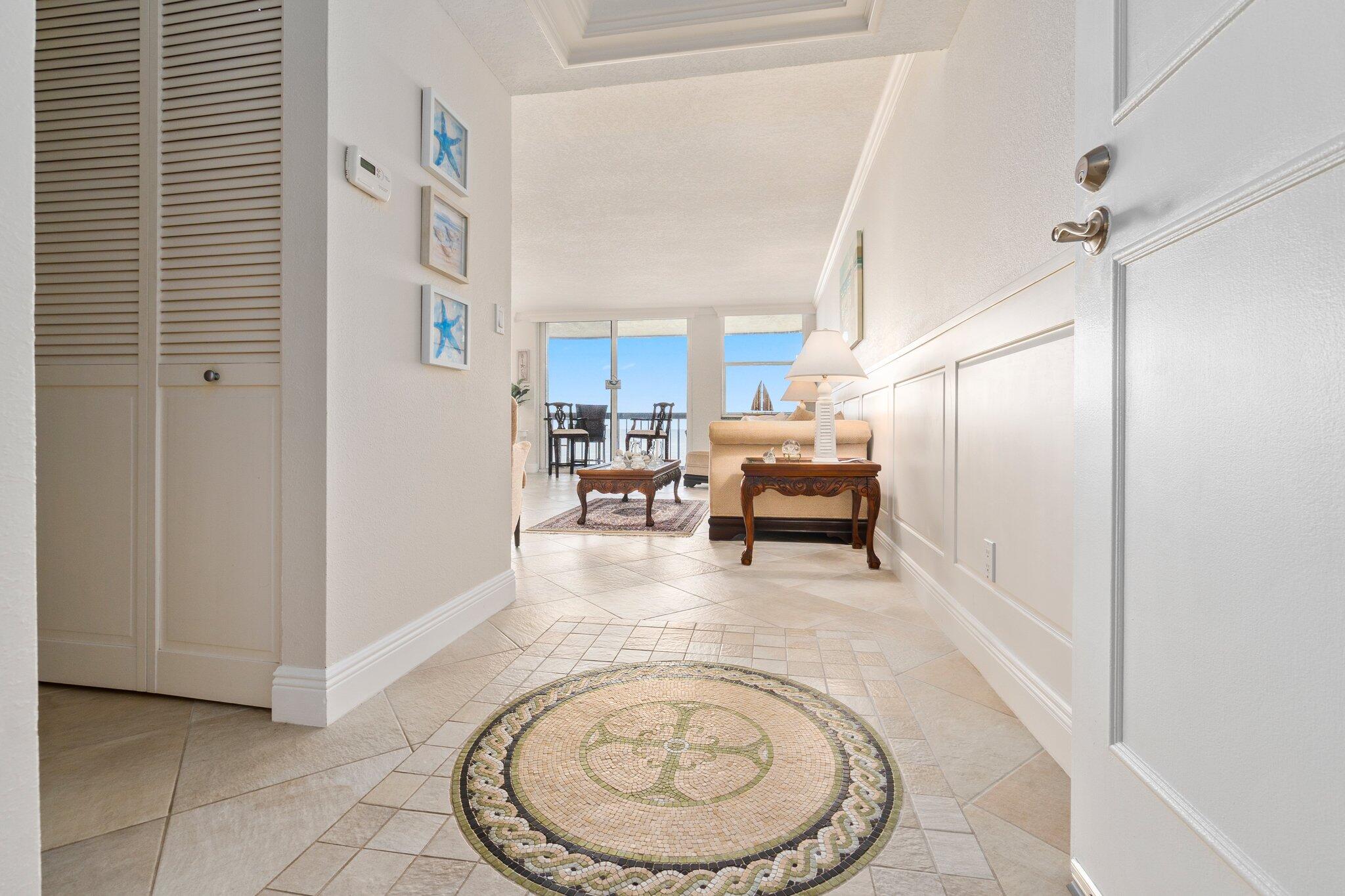 3100 North Hwy A1A, Unit PHA4 Fort Pierce, FL 34949 - Photo 41 of 54 a view of a livingroom with furniture and a kitchen