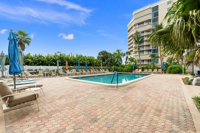 a view of a swimming pool with outdoor space