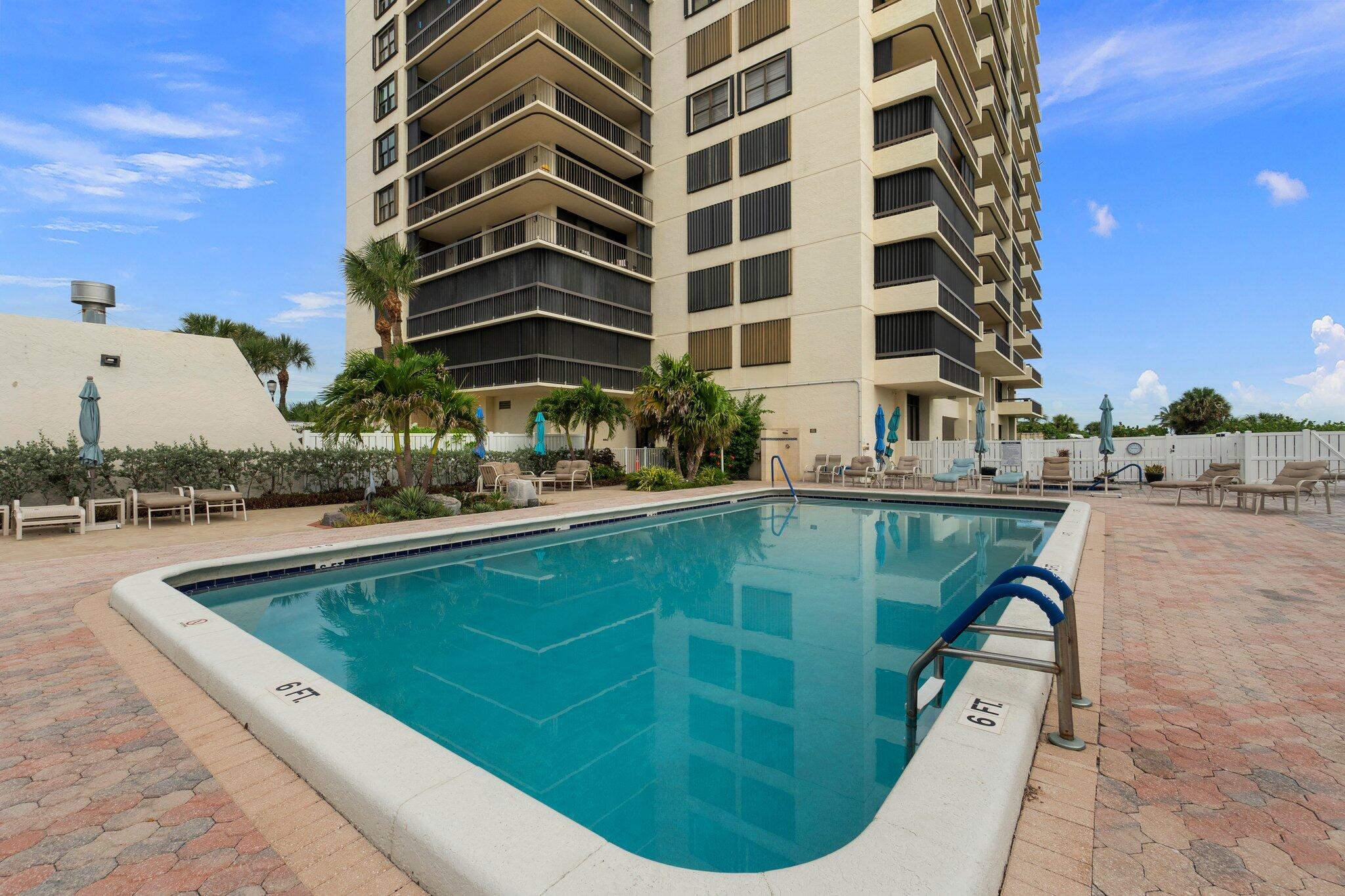 3100 North Hwy A1A, Unit PHA4 Fort Pierce, FL 34949 - Photo 45 of 54 a view of a swimming pool with outdoor space
