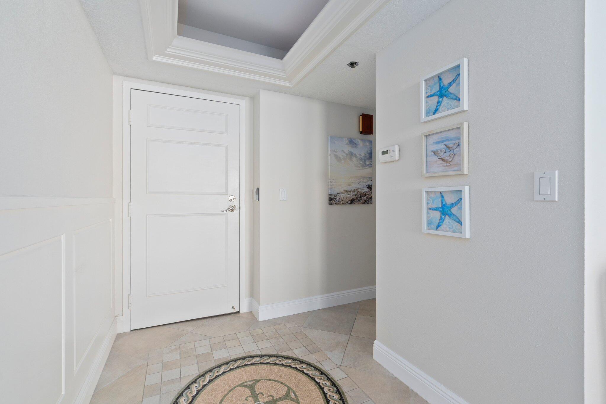 3100 North Hwy A1A, Unit PHA4 Fort Pierce, FL 34949 - Photo 9 of 54 a view of entryway with workspace