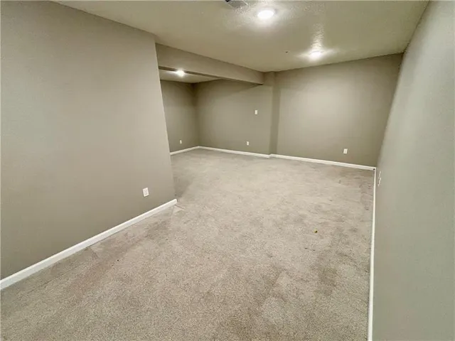an empty room with an entryway