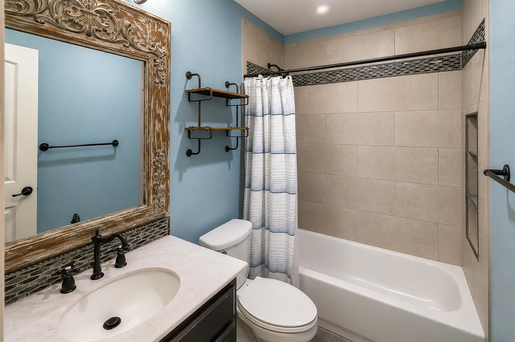 1070 Shepard Lane Lavon, TX 75166 - Photo 23 of 29 a bathroom with a sink toilet and shower