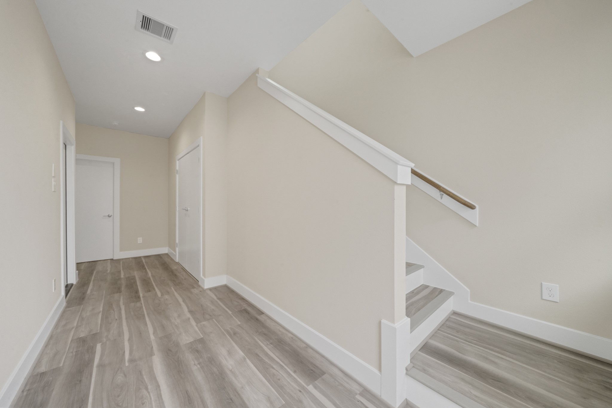 2502 West Tidwell Road, Unit A Houston, TX 77091 - Photo 17 of 22 a view of entryway with wooden floor