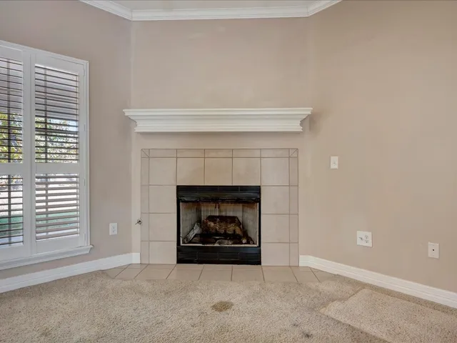 a living room with a fireplace