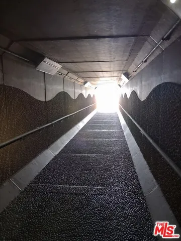 a view of a chairs and table in backyard