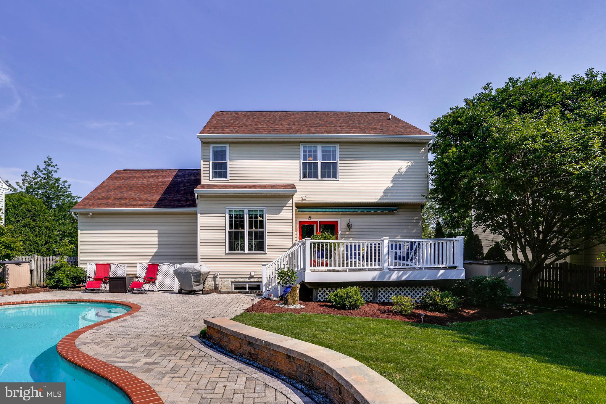 407 River Road Arnold, MD 21012 - Photo 3 of 31 Beautiful landscaping, pool and deck