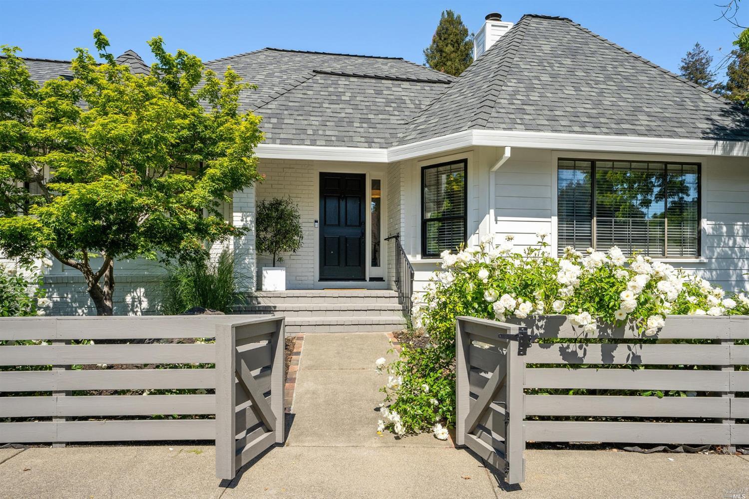 a view of a house with a garden