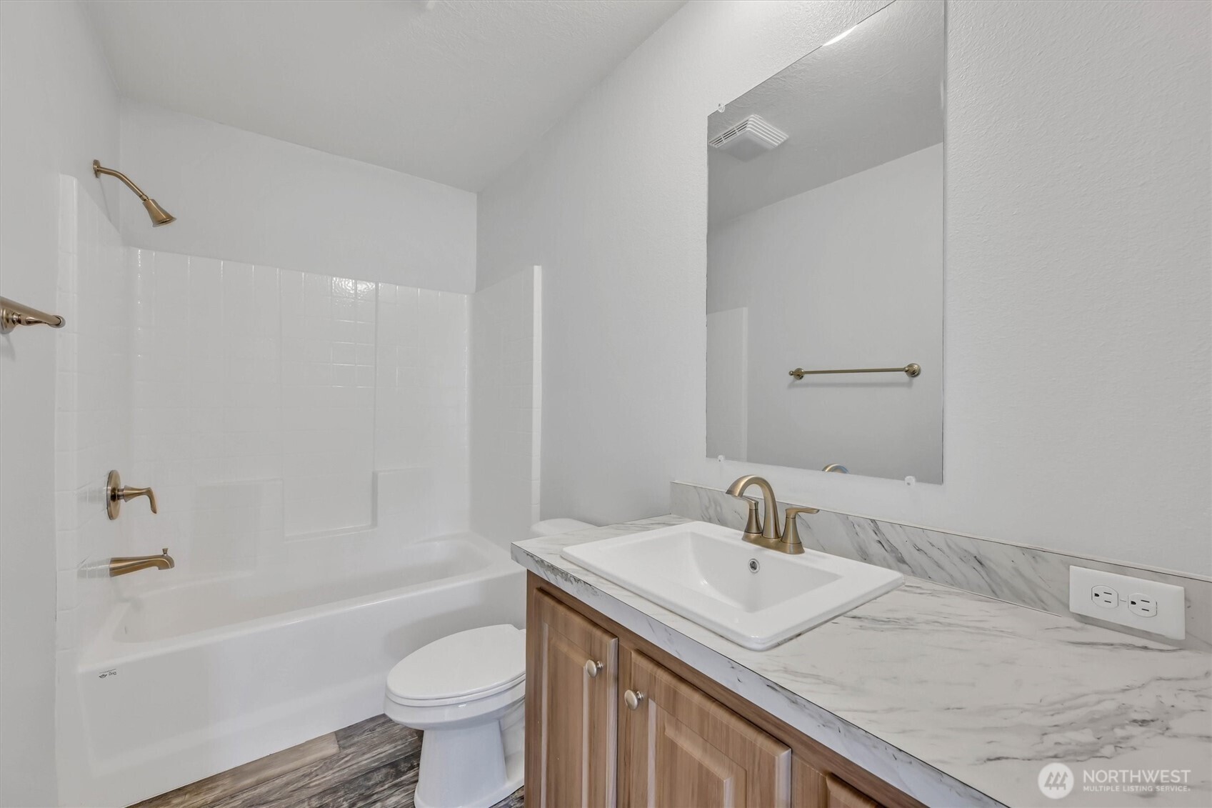 228 Mossyrock Road West Mossyrock, WA 98564 - Photo 16 of 27 a bathroom with a granite countertop sink a toilet and shower