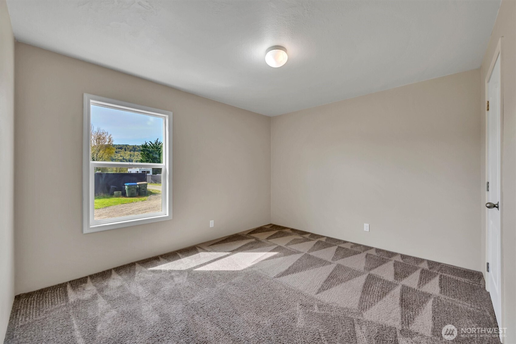 228 Mossyrock Road West Mossyrock, WA 98564 - Photo 18 of 27 a view of an empty room with a window