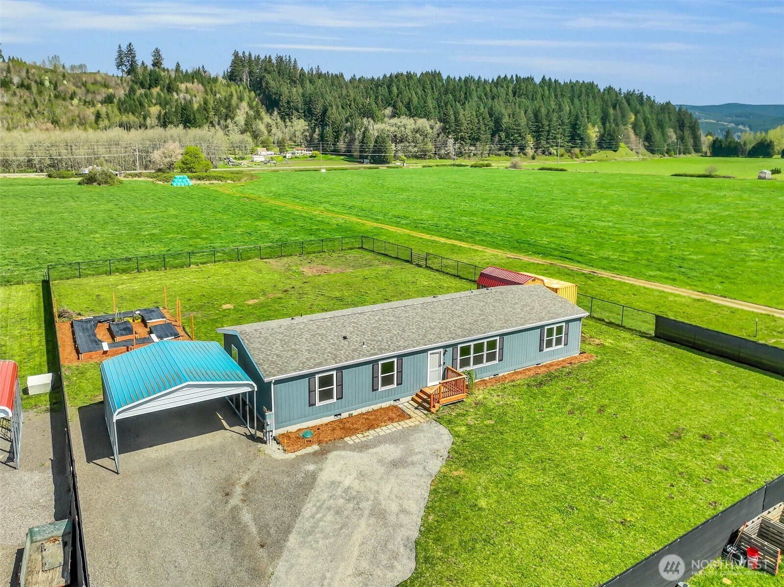 228 Mossyrock Road West Mossyrock, WA 98564 - Photo 22 of 27 a aerial view of a house with a big yard
