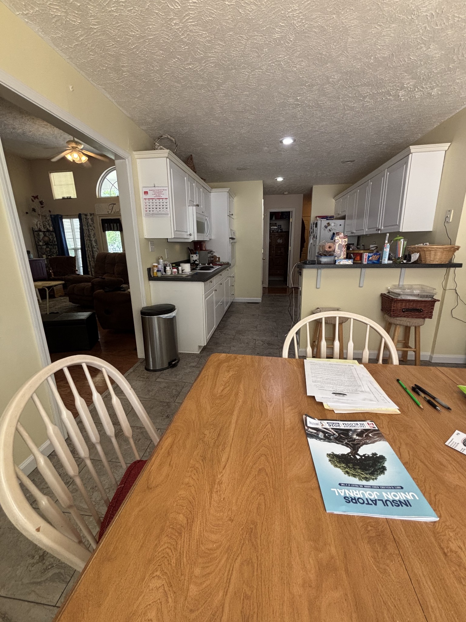 206 Dreaden Street Waverly, TN 37185 - Photo 12 of 26 a kitchen that has a lot of cabinets in it