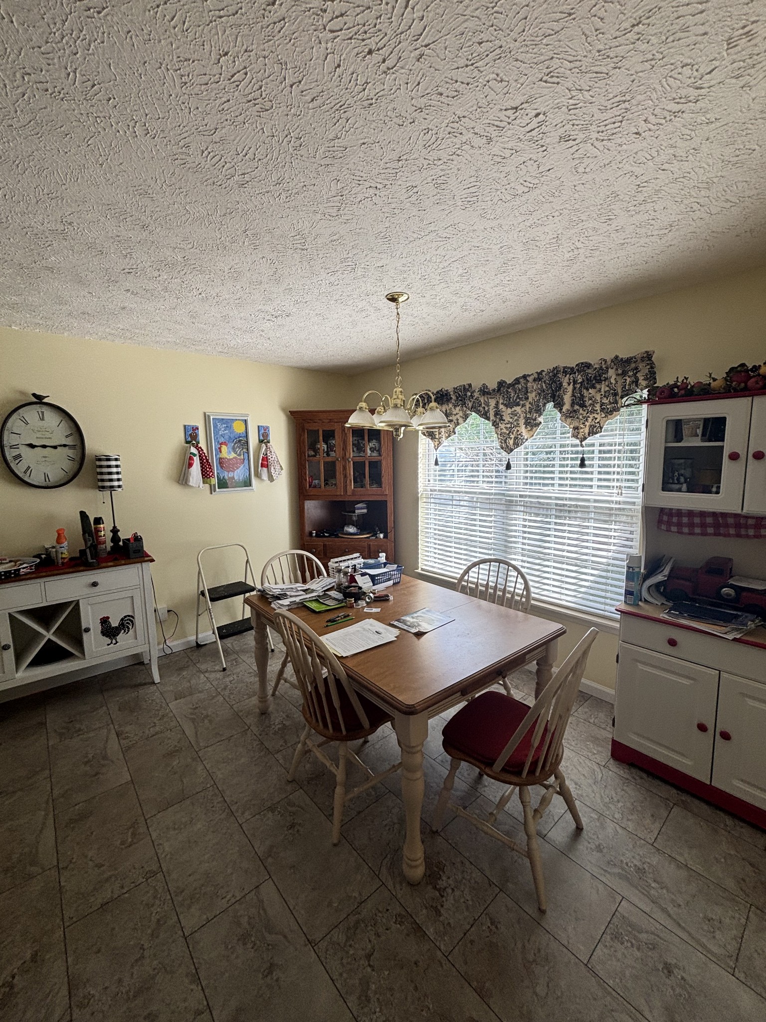 206 Dreaden Street Waverly, TN 37185 - Photo 13 of 26 a dinning table and chairs in a room