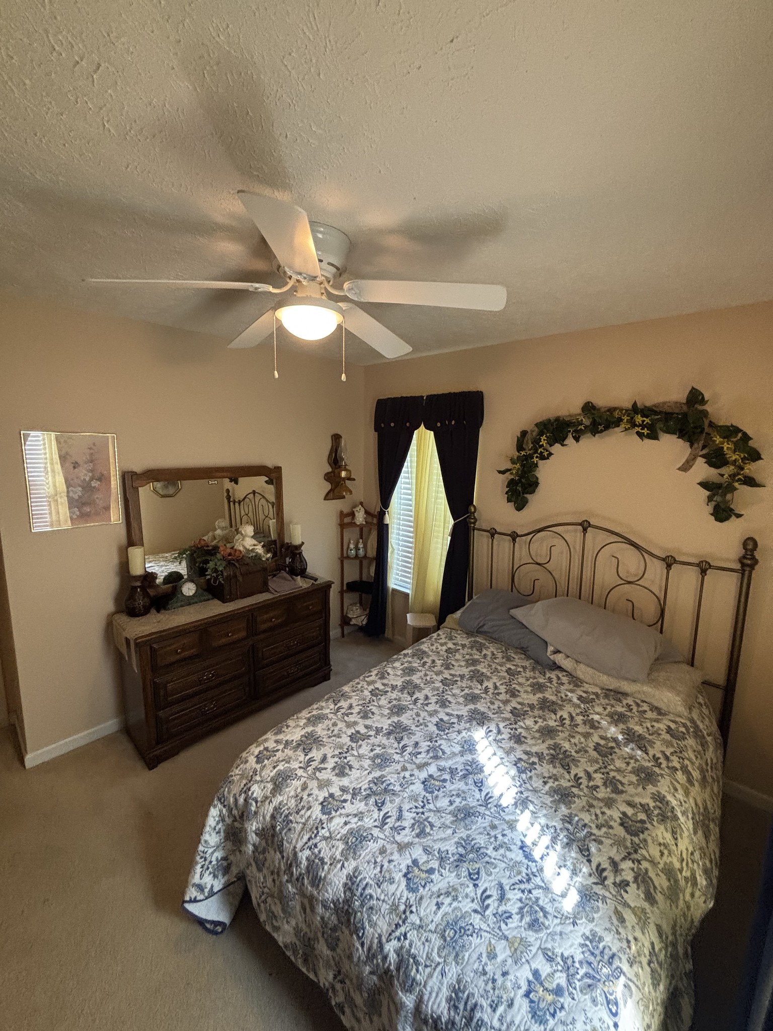 206 Dreaden Street Waverly, TN 37185 - Photo 19 of 26 a bed room with a bed and a television