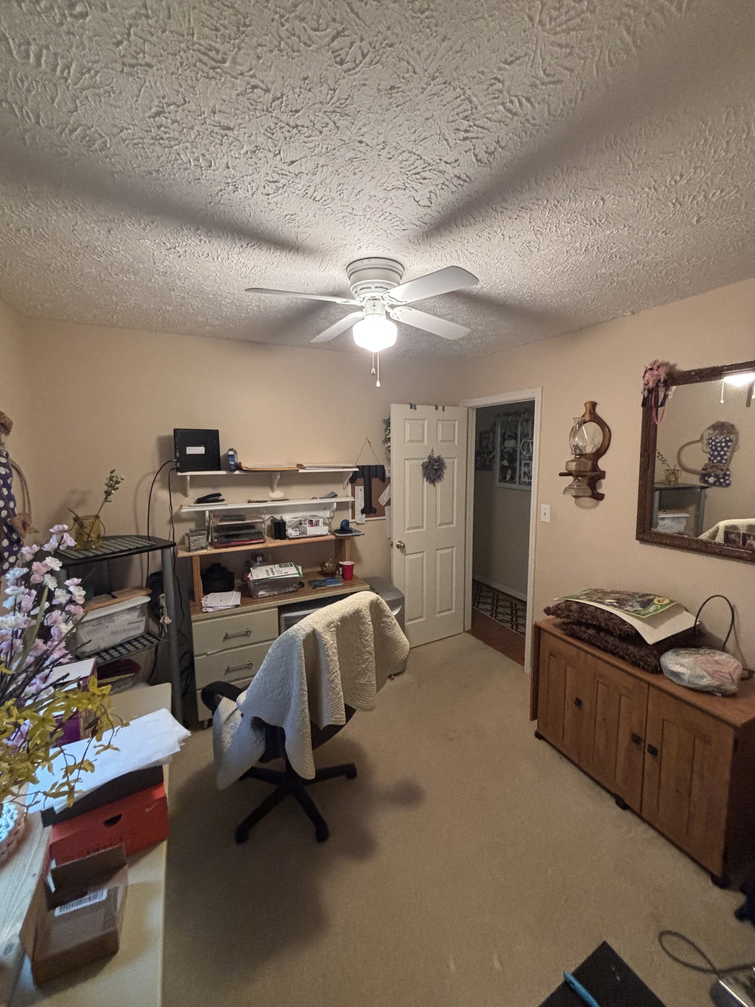 206 Dreaden Street Waverly, TN 37185 - Photo 20 of 26 a view of a workspace with furniture