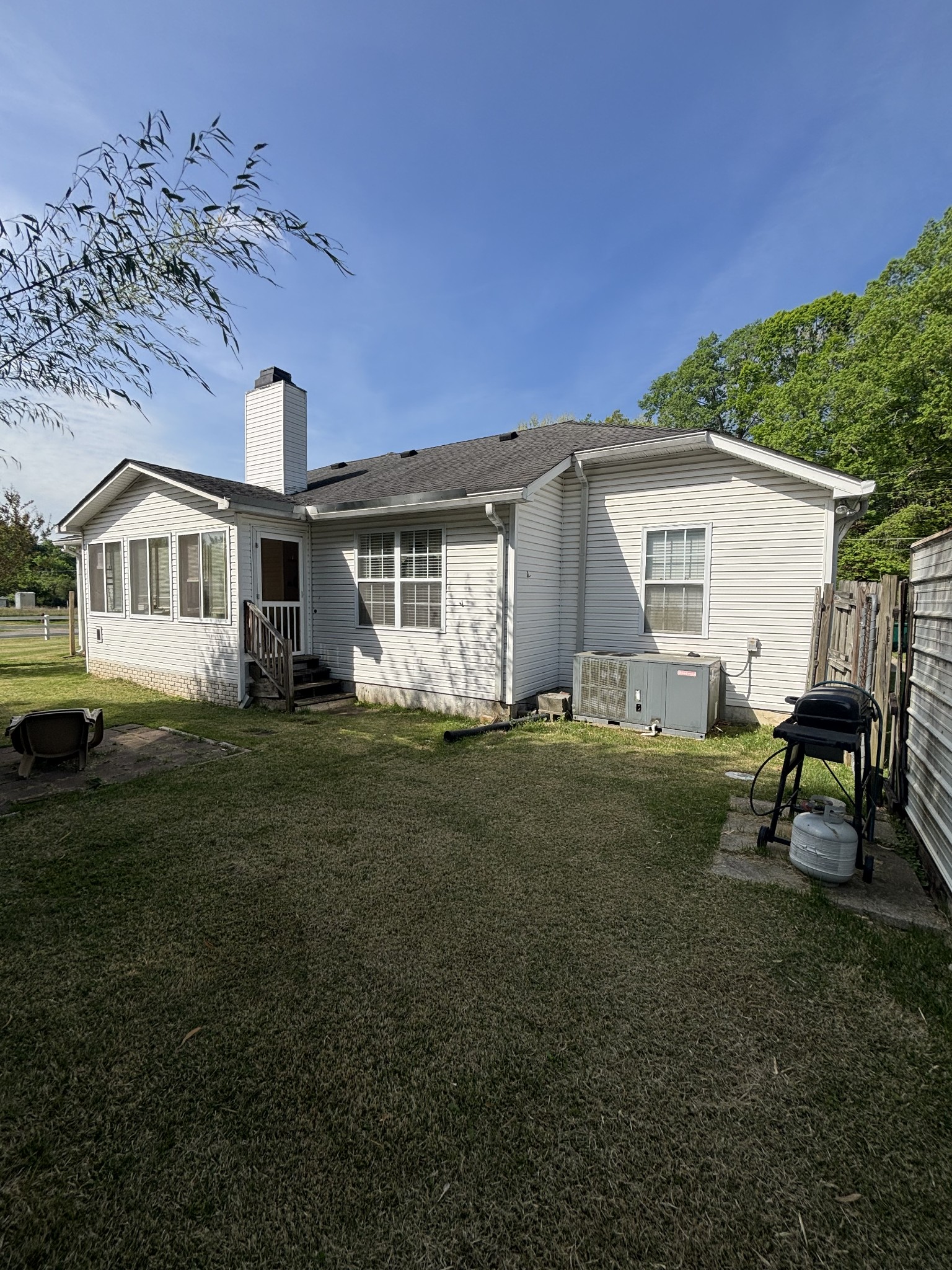 206 Dreaden Street Waverly, TN 37185 - Photo 5 of 26 a view of a house with a yard