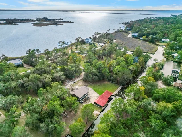 a view of a lake with a yard