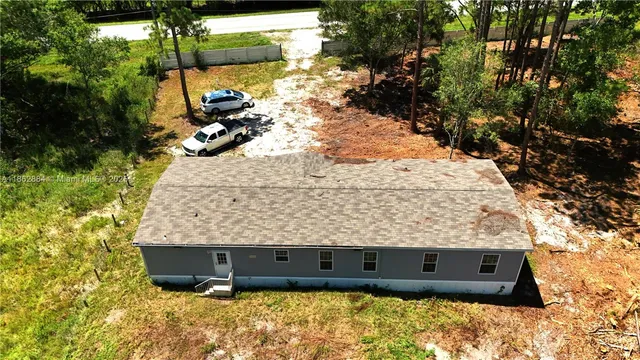 a view of a yard with an outdoor space