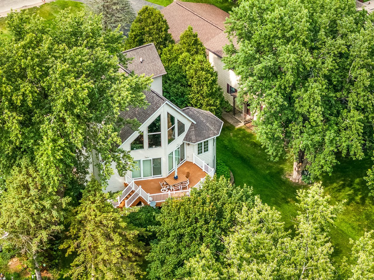 213 Lake Summerset Road Davis, IL 61019 - Photo 6 of 9 an aerial view of a house with swimming pool and garden view