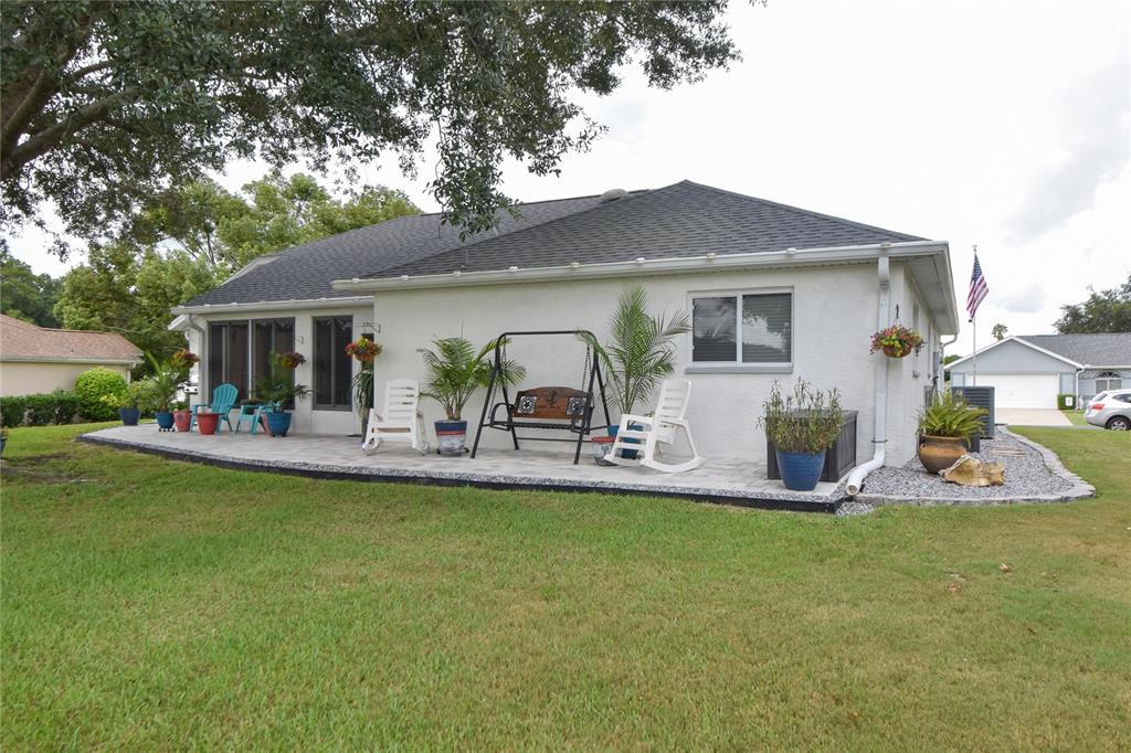 5366 Northwest 21st Loop Ocala, FL 34482 - Photo 21 of 36 a view of a house with a yard porch and sitting area
