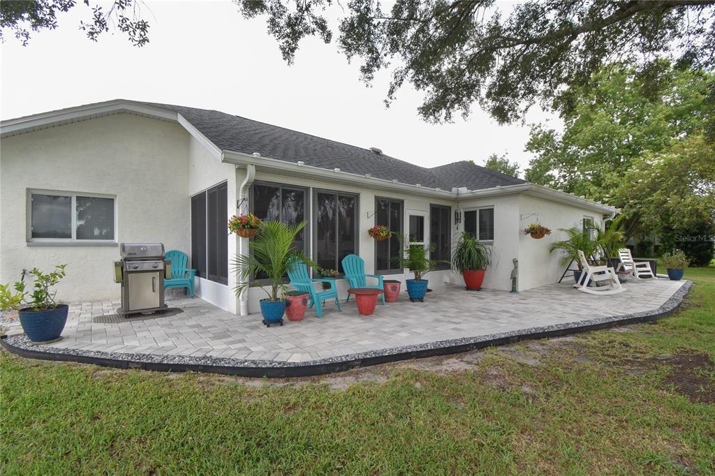 5366 Northwest 21st Loop Ocala, FL 34482 - Photo 24 of 36 a view of a house with backyard porch and sitting area