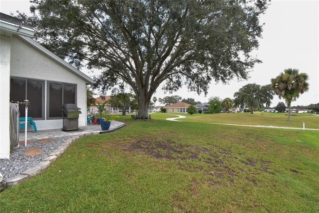 5366 Northwest 21st Loop Ocala, FL 34482 - Photo 26 of 36 a view of a house with a yard