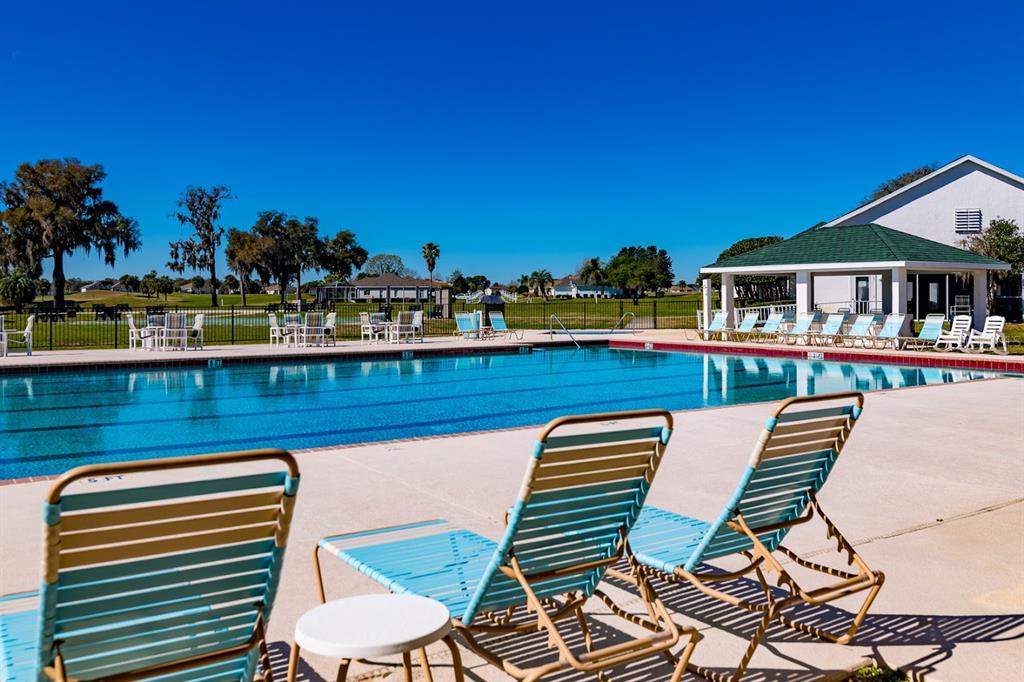 5366 Northwest 21st Loop Ocala, FL 34482 - Photo 32 of 36 a chairs and a table in a balcony
