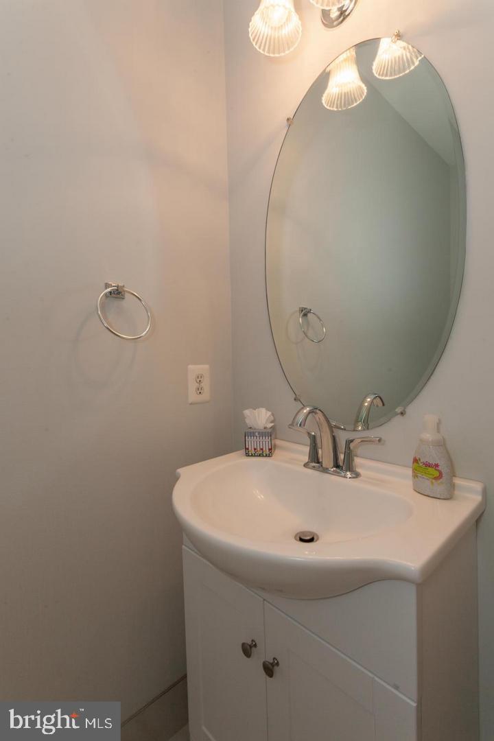 11401 Gate Hill Place, Unit 72 Reston, VA 20194 - Photo 14 of 30 Renovated Half Bath on Main Level